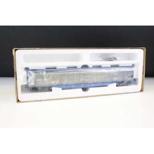35 - Four boxed Heljan OO gauge items of rolling stock to include 5010 Cargowagen basic blue & silver wea... 