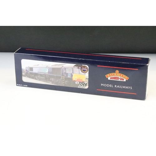 39 - Four boxed OO gauge locomotives to include Bachmann 32977 Class 66/9 Diesel DRS/Stobert Rail 66411 a... 