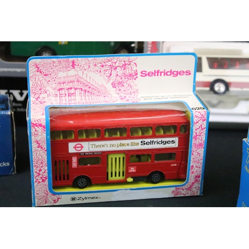 1042 - 12 Boxed diecast models to include Volvo B10 M Ledbuss, Somerville Fordson 5CWT Van, NZG 1/60 No 168... 