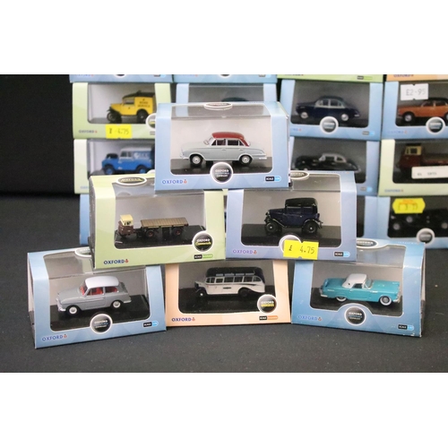 1043 - 56 Boxed / cased 1/76 and N Gauge scale Oxford diecast models to include Commercials and Omnibus exa... 