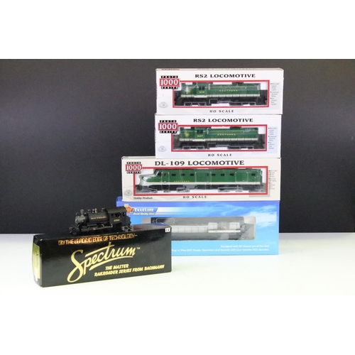 52 - Five boxed HO gauge locomotives to include Broadway Limited Blueline 5030 EMD SD9, 3 x Life Like Tra... 