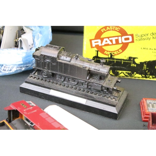 82 - Quantity of OO gauge model railway spares and repairs to include engine chassis', engine shells, rol... 