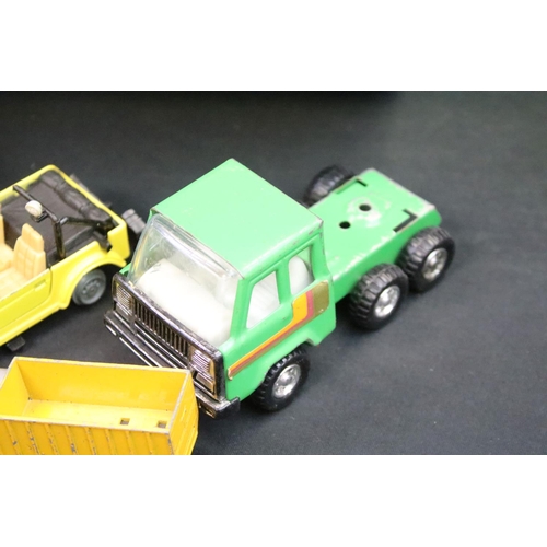 1207 - Large collection of play worn diecast models, featuring mid 20th C examples, to include Dinky, Brita... 