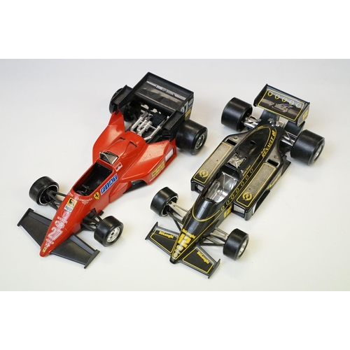 1077 - 16 Burago 1/24 diecast & plastic model Formula One models to include Williams FW 08, Lotus 97T etc, ... 