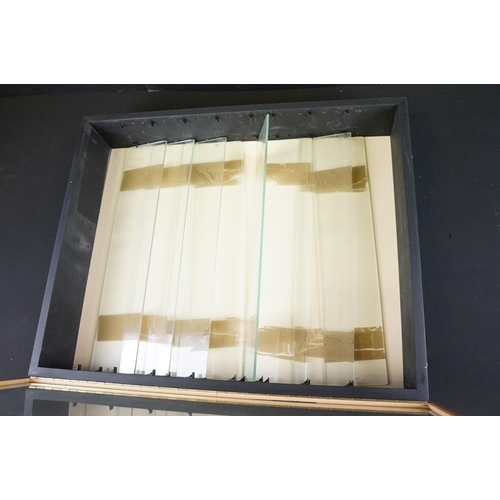 1137 - Two glazed wooden wall mounted display cabinets with glass shelves, measuring approx 49cm x 65cm and... 