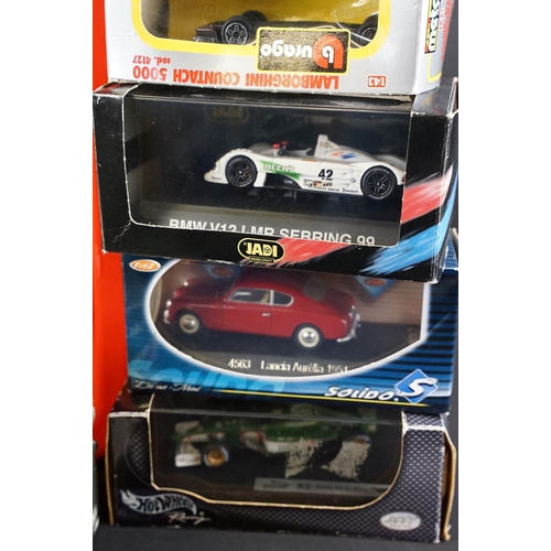 1160 - Collection of around 50 various boxed / cased diecast models to include Burago Ford Sierra Rally, So... 