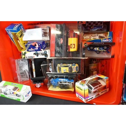 1160 - Collection of around 50 various boxed / cased diecast models to include Burago Ford Sierra Rally, So... 