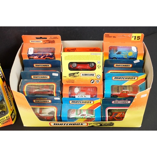 1162 - Around 40 boxed / carded Mattel Hot Wheels & Matchbox diecast models, circa 1980's / 90's, featuring... 