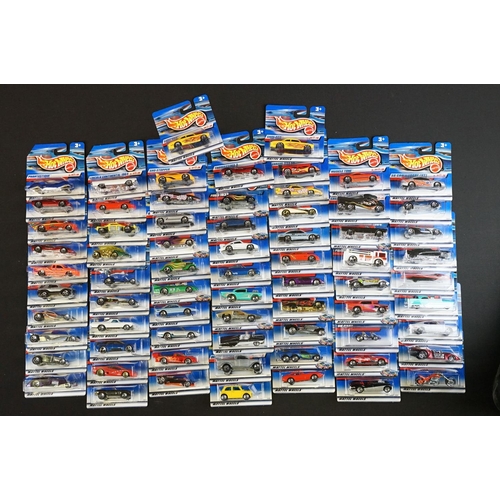 1165 - Ex Shop Stock - Around 70 carded Mattel Hot Wheels diecast models, contained within Hot Wheels cardb... 