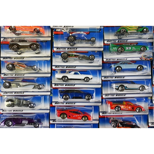 1165 - Ex Shop Stock - Around 70 carded Mattel Hot Wheels diecast models, contained within Hot Wheels cardb... 