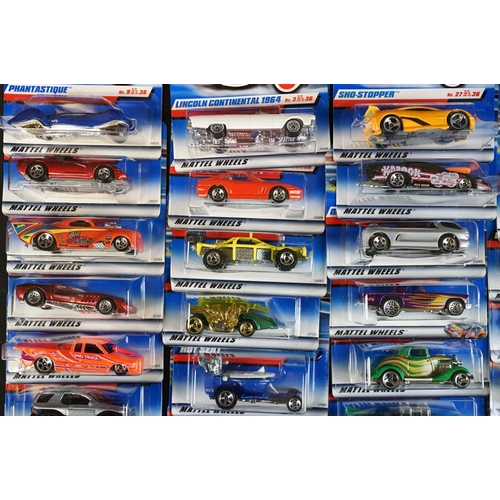 1165 - Ex Shop Stock - Around 70 carded Mattel Hot Wheels diecast models, contained within Hot Wheels cardb... 