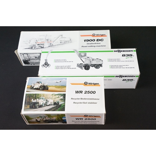 1265 - Three boxed 1/50 scale construction diecast models to include Conrad Model No. 2845/0 Sennebogen 835... 