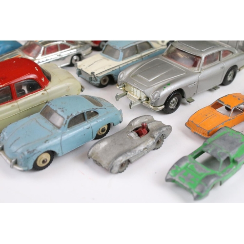 1319 - Collection of over 40 play worn diecast models, mostly mid 20th C examples, to include Corgi, Dinky,... 