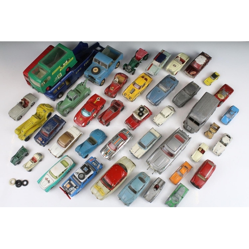 1319 - Collection of over 40 play worn diecast models, mostly mid 20th C examples, to include Corgi, Dinky,... 