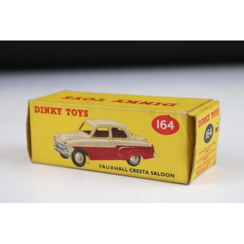 1352 - Six boxed Dinky diecast models to include 158 Riley Saloon in cream with green hubs, 164 Vauxhall Cr... 