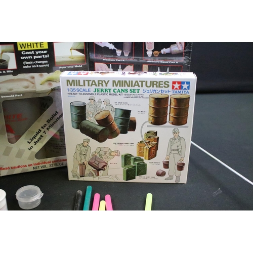 208 - Four boxed Tamiya plastic military model kits and figure sets to include 2 x 1/35 35026 Jerry Cans, ... 