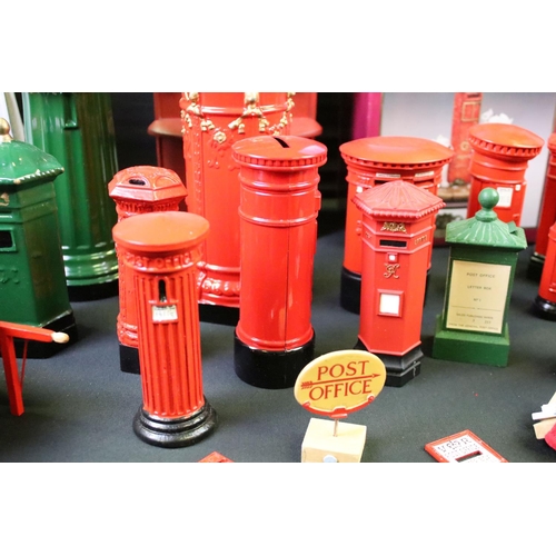 213 - Collection of postal related items to include various pillar box models (2 boxes)
