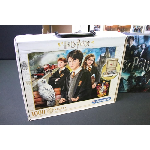 217 - 14 Boxed Harry Potter jigsaw puzzles to include 12 x 1000 piece puzzles (featuring a sealed example)... 