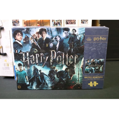 217 - 14 Boxed Harry Potter jigsaw puzzles to include 12 x 1000 piece puzzles (featuring a sealed example)... 