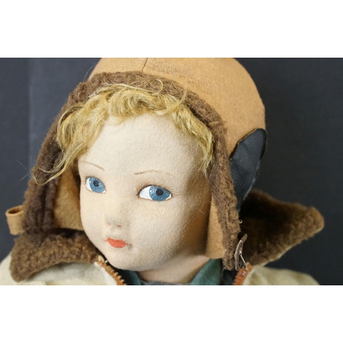 362 - Large Norah Wellings female pilot felt doll, circa 1940's, with pilot uniform, helmet, parachute & h... 