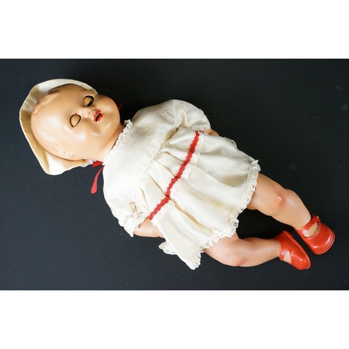 363 - Group of four mid 20th C dolls to include a Pedigree hard plastic doll (approx 46cm tall), two boxed... 