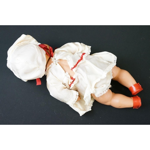 363 - Group of four mid 20th C dolls to include a Pedigree hard plastic doll (approx 46cm tall), two boxed... 