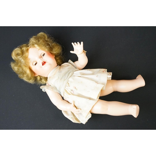 363 - Group of four mid 20th C dolls to include a Pedigree hard plastic doll (approx 46cm tall), two boxed... 