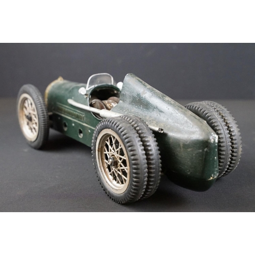 1393 - Early-to-mid 20th C scratch built model of a racing car, in dark green, with chain & cog wind-up mec... 