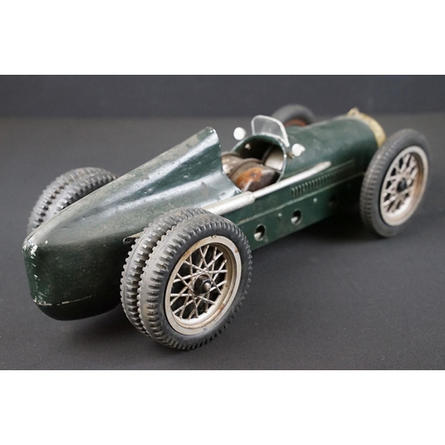 1393 - Early-to-mid 20th C scratch built model of a racing car, in dark green, with chain & cog wind-up mec... 