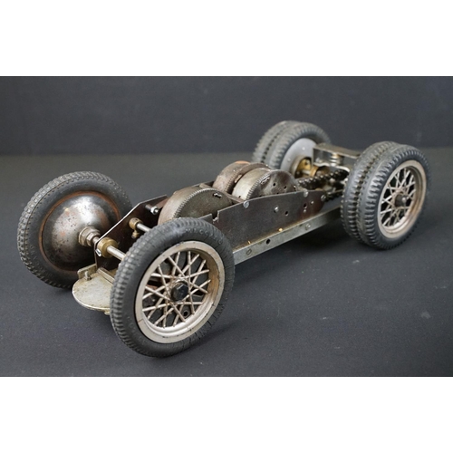 1393 - Early-to-mid 20th C scratch built model of a racing car, in dark green, with chain & cog wind-up mec... 