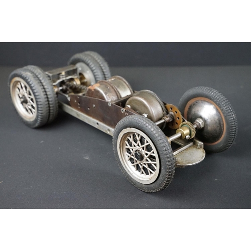 1393 - Early-to-mid 20th C scratch built model of a racing car, in dark green, with chain & cog wind-up mec... 