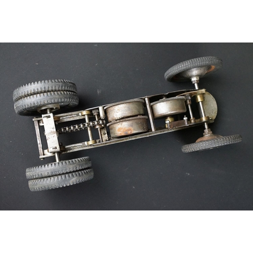 1393 - Early-to-mid 20th C scratch built model of a racing car, in dark green, with chain & cog wind-up mec... 