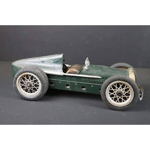 1393 - Early-to-mid 20th C scratch built model of a racing car, in dark green, with chain & cog wind-up mec... 