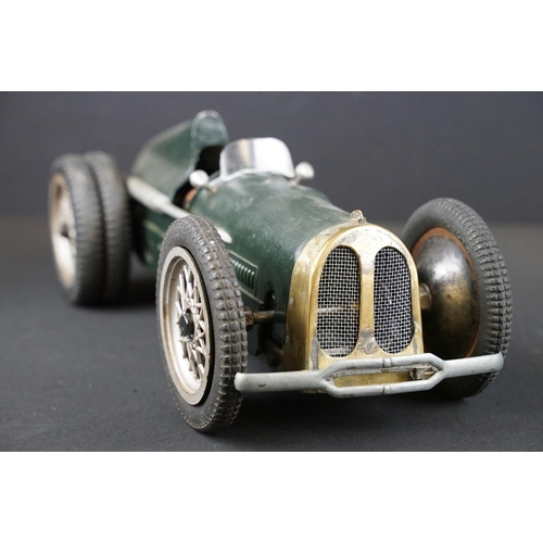 1393 - Early-to-mid 20th C scratch built model of a racing car, in dark green, with chain & cog wind-up mec... 