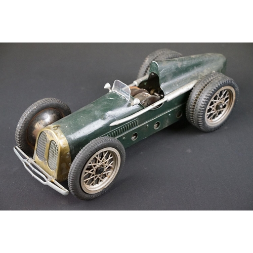 1393 - Early-to-mid 20th C scratch built model of a racing car, in dark green, with chain & cog wind-up mec... 