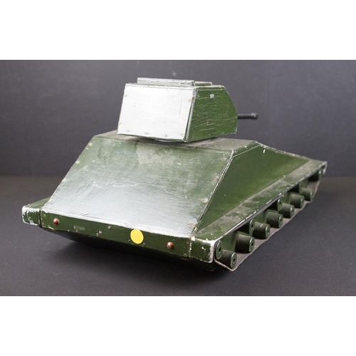 1395 - Large wooden scratch built green painted army tank model with moveable wheels and moving tank gun wi... 