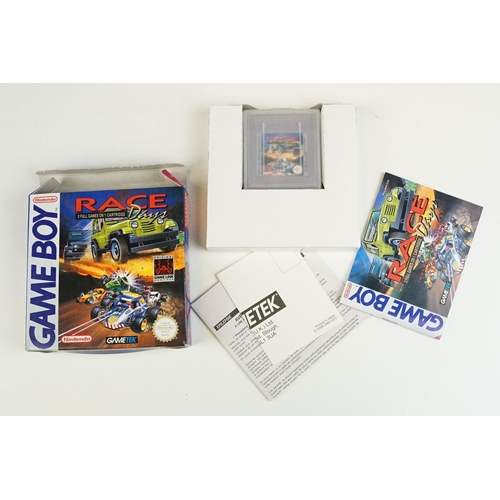 1502 - Retro Gaming - Boxed Nintendo Game Boy Pocket, together with three Nintendo Game Boy games to includ... 