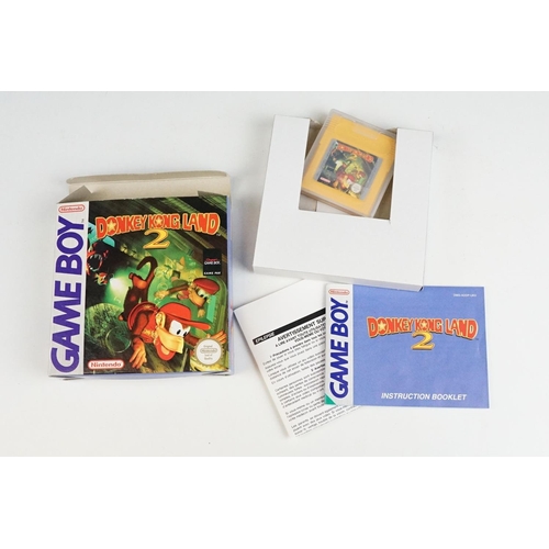 1502 - Retro Gaming - Boxed Nintendo Game Boy Pocket, together with three Nintendo Game Boy games to includ... 