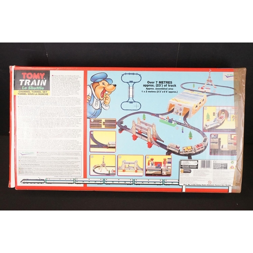 240 - Three boxed TOMY train and construction sets to include Train Le Shuttle Channel Tunnel Set, Train E... 