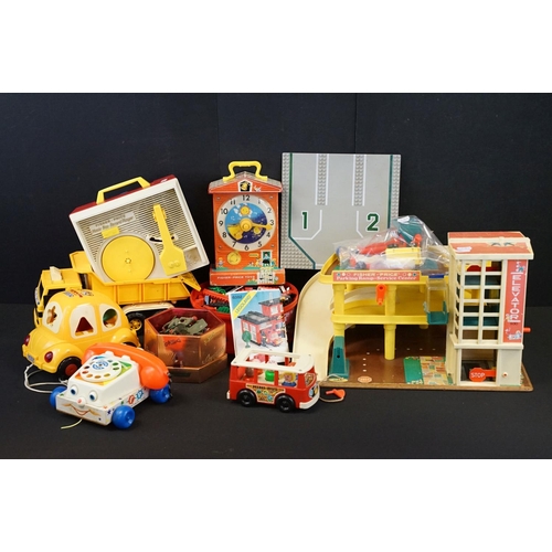 244 - Collection of various mixed toys to include a quantity of Fisher Price items featuring Mini Bus, Dum... 