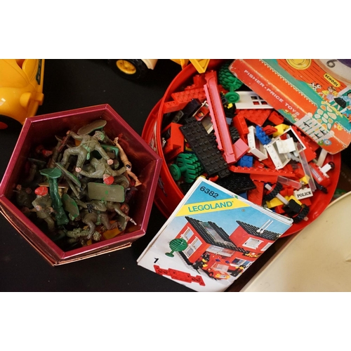 244 - Collection of various mixed toys to include a quantity of Fisher Price items featuring Mini Bus, Dum... 