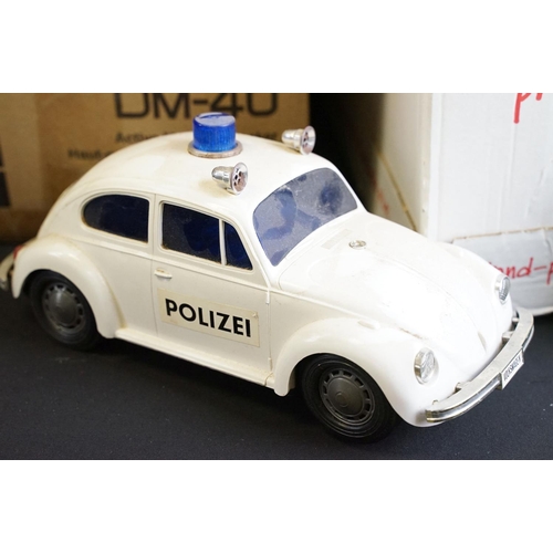 245 - Collection of mixed toys to include Japanese Polizei Volkswagen, boxed Taiyo Radio controlled Porsch... 