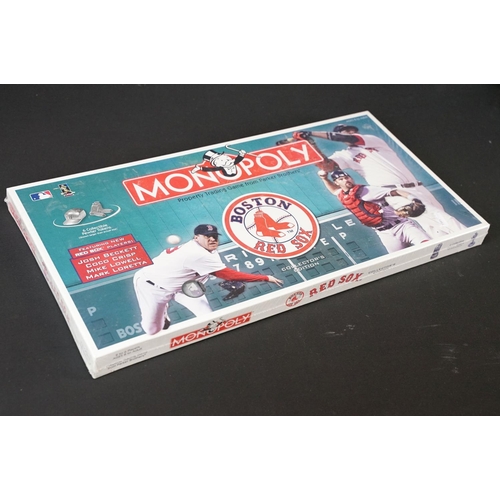 259 - Boston Red Sox collectables to include a sealed Collector's Edition Monopoly, MLB baseball, MLB cap ... 