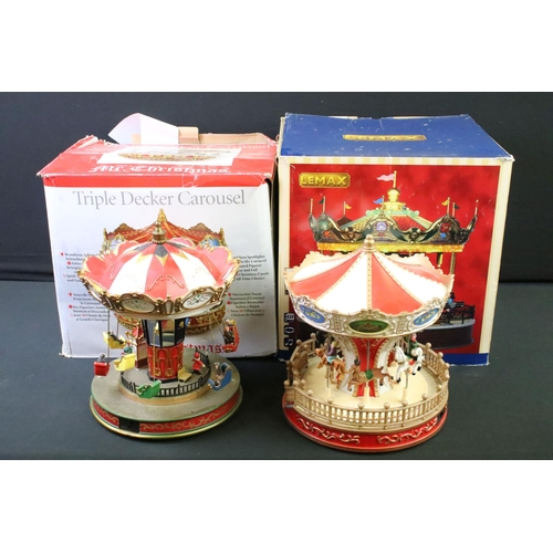 1418 - Two boxed battery operated carousels to include Lemax Sunshine Carousel (damage to three flags) & Mr... 