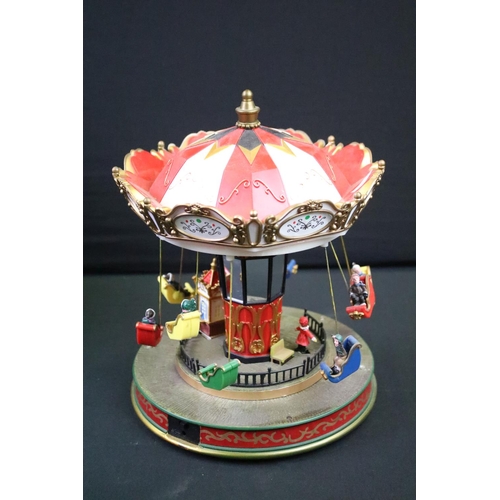 1418 - Two boxed battery operated carousels to include Lemax Sunshine Carousel (damage to three flags) & Mr... 