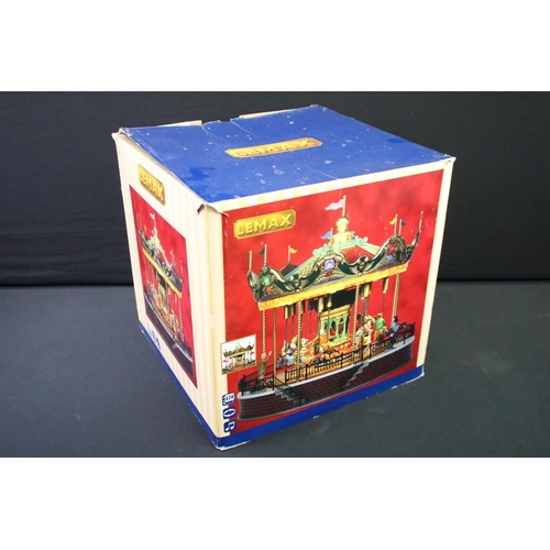 1418 - Two boxed battery operated carousels to include Lemax Sunshine Carousel (damage to three flags) & Mr... 