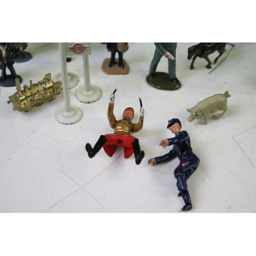 310 - Quantity of metal figures to include military, hunting, roadside signs, boxed Drumbeat Toy Soldiers,... 