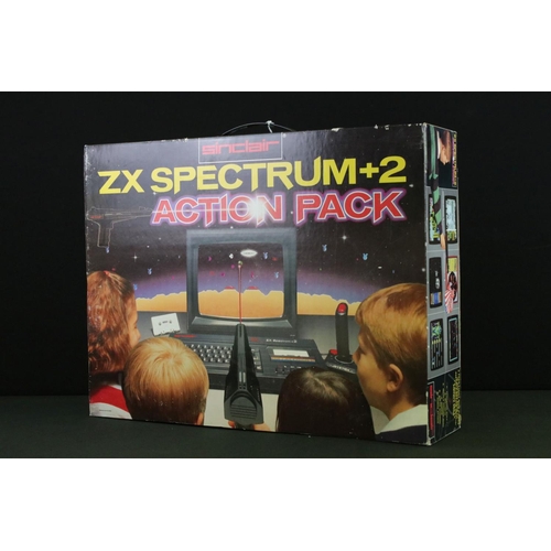 1472 - Retro Gaming - A boxed Sinclair ZX Spectrum +2 Action Pack, with computer, power supply, joystick, l... 