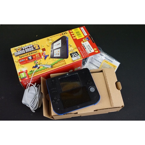 1430A - Retro Gaming - Five boxed Nintendo handheld games consoles to include New Super Mario Bros. 2 Ninten... 