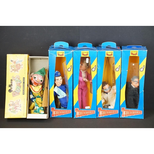 396 - Four boxed Pelham Puppets Thunderbirds puppets to include Lady Penelope, Brains, Parker (box shows t... 